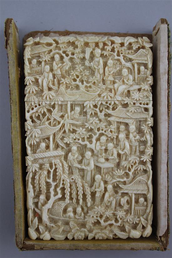 A Chinese export carved ivory card case, 19th century, 11cm, with original brocade covered card box (a.f.)